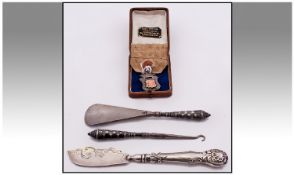 A Collection of Vintage Silver Items, comprises: 1). Victorian silver fish knife, hallmarked