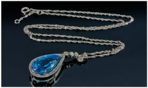 18ct White Gold Set Blue Topaz and Diamond Pear Shaped Pendant Drop. Fitted on a 18ct white gold