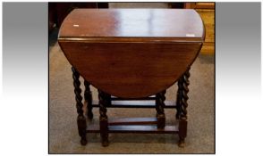 Small Oak 1930`s Candy Twist Leg Drop Leaf Table, with demi lune shaped flaps. Width 28 inches,