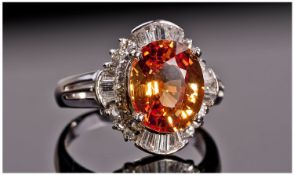 14ct White Gold Diamond & Orange Sapphire Ring, Set With A Large Central Sapphire, (Estimated