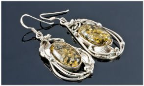 Pair of Silver and Amber Set Earrings.