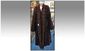 Mink Stripe Full Length Coat, fully lined. Hook and eye fastening. Slit Pockets. Approx size 12-14.