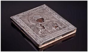 A 19th Century Russian Silver Travelling Icon. Depicts a Saint in traditional pose. Titled in