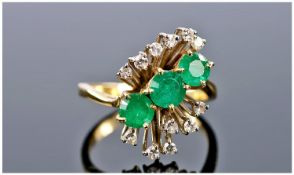 18ct Gold Diamond & Emerald Cluster Ring, the 3 round cut emeralds flanked by 12 small diamonds in