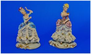 Capodimonte Good Pair of Lace Figures, Ladies In 18th Century Costume. Each Figure 8 Inches High.
