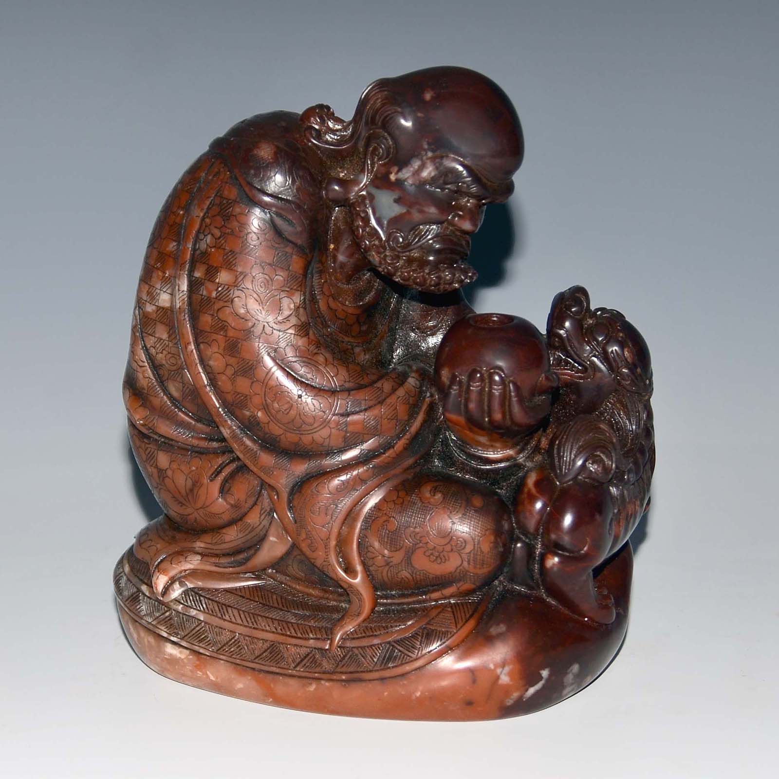 "??????????A Well Carved Shoushan Stone Figure Group of Luohan Taming LionSeated and holding an elms