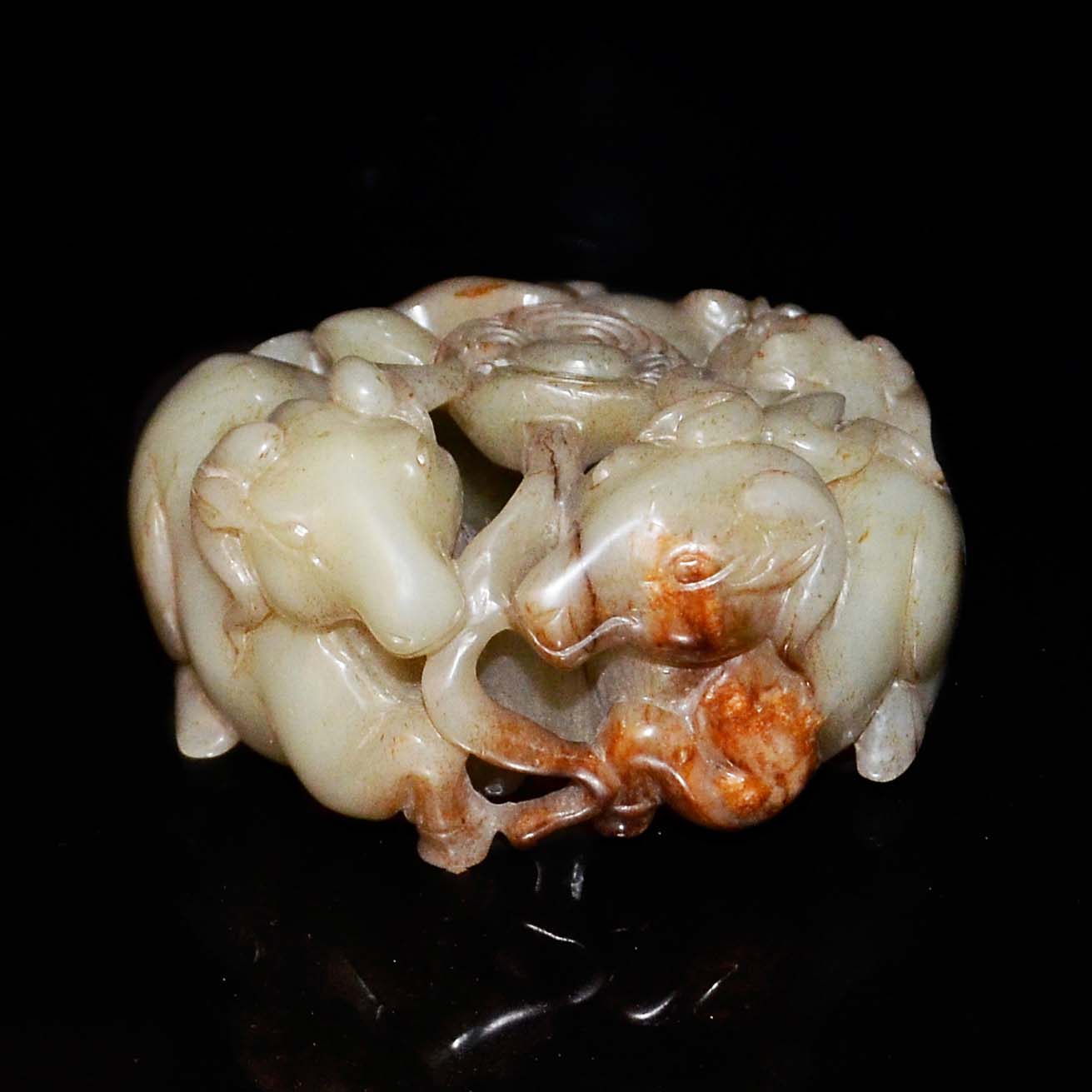 "????????A Jade Carving of Three-Ram with Buff Inclusion Height: 2¼ in (5.7 cm)Weight: 776 g"