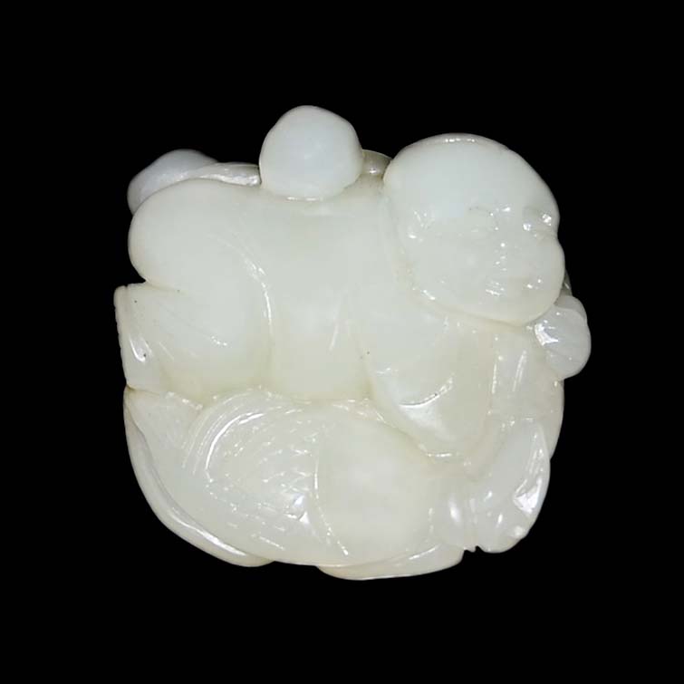 "??????????A Jade Carving of Boy Riding a CarpHolding a lotus stalk with ruyi carving in reverse,