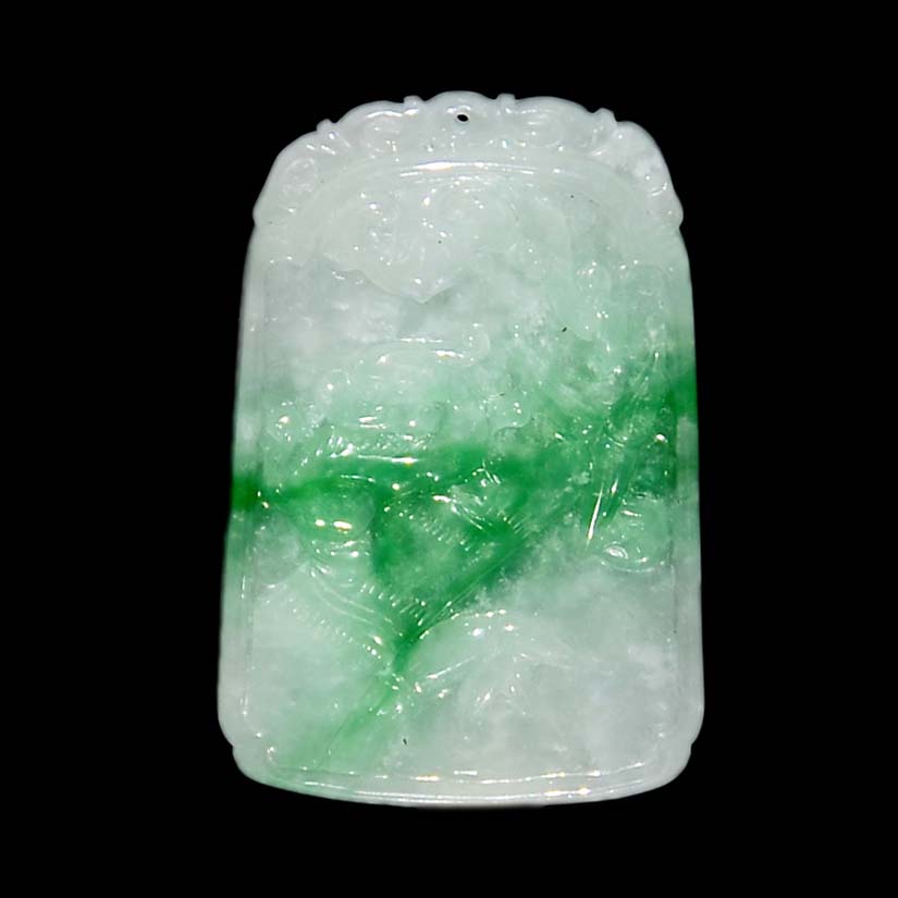 "????????A Jadeite Plaque PendantThe rectangular plaque carved on both sides in shallow relief