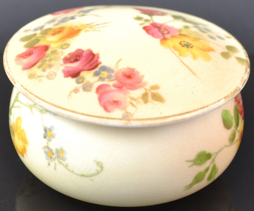 Royal Worcester covered bowl, date mark for 1903, floral decoration on a blush ground, diameter