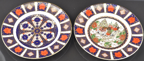 Royal Crown Derby octagonal plate, no 1128, 22cm, boxed and three other Imari plates (4).