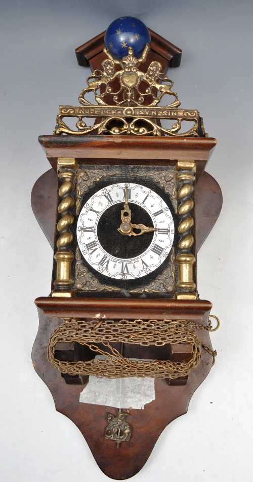 Dutch reproduction wall clock, a cast atlas figure, 51cm with weights.