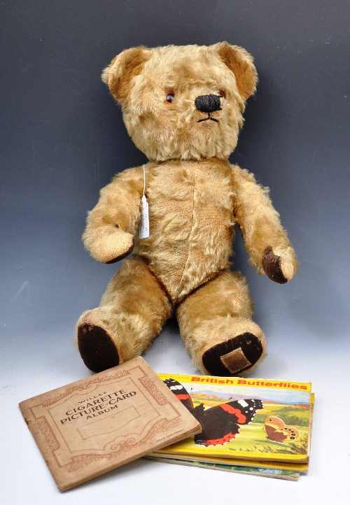 Chad  Valley gold plush growling teddy bear, a large collection of cigarette cards mostly in albums,