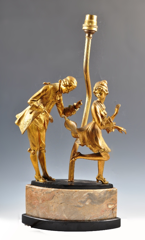 Gotthilf Jaeger, gilt bronze group, lamp base, the raised hem on a navette shaped two colour