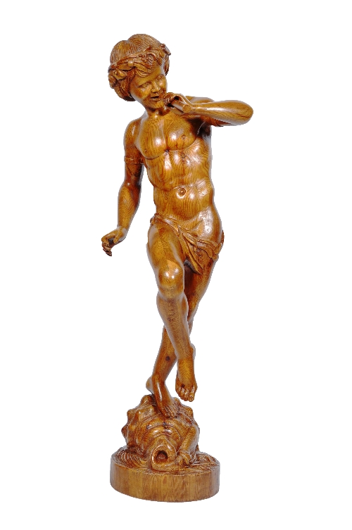 A carved pine figure of Pan, late 20th Century, standing with his left foot resting on a shell,