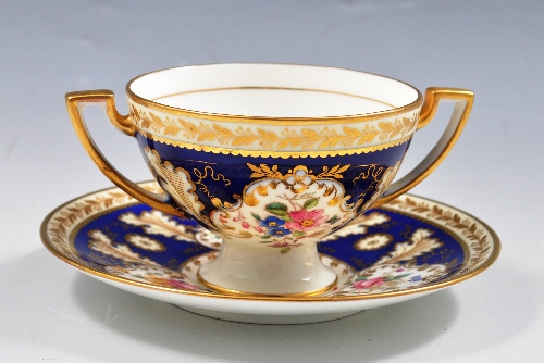 Cauldon bone china two handled cup and saucer, for Tiffany & Co, New York, floral decoration with