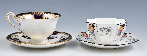 Shelley bone china trio, printed floral decoration, pattern No. 11498, a matching sugar bowl and tea