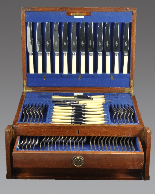 A canteen of silver cutlery, moulded Trefid pattern by Walker & Hall, Sheffield 1933, comprising six