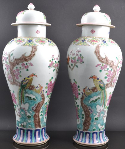 A pair of Chinese polychrome porcelain baluster shape vases, bearing Kangxi six character marks,