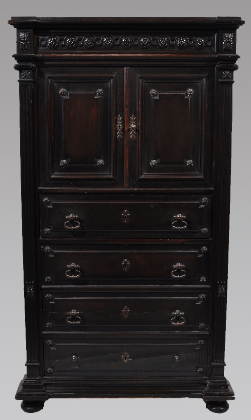 A Continental ebonised side cabinet, probably French or German, mid 19th Century, projecting