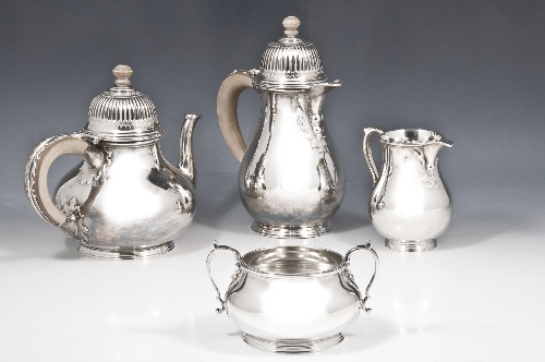 A George I style silver tea set, by William Comyns & Sons Limited, London, comprising compressed