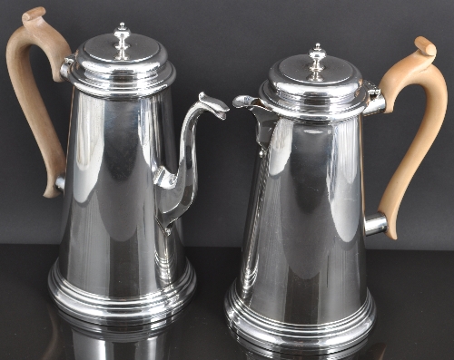 A George I style silver coffee pot and matching hot water jug by Garrard & Co Limited, London