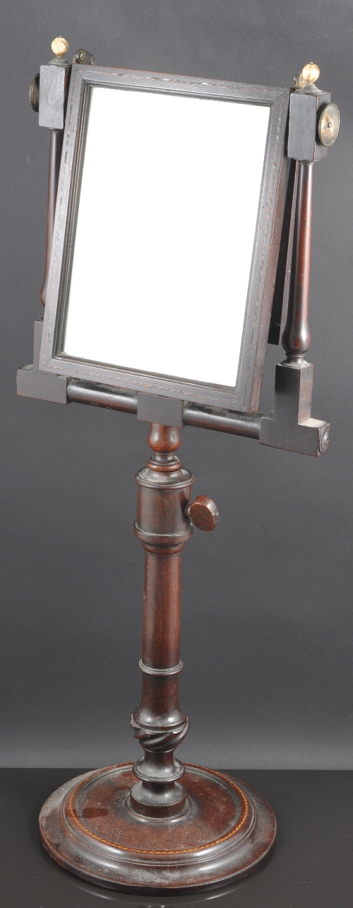 A George III mahogany zograscope, damage lens, adjustable column, circular base with stringing,