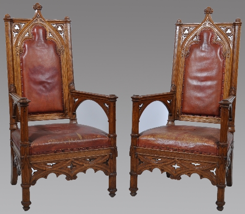 A pair of Victorian Gothic oak ecclesiastical seats crochet backs with pierced tracery and open