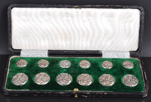 Two matching sets of Edwardian silver buttons, by H Matthews, Birmingham 1902, cast scrolled