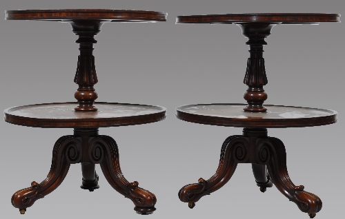 A near pair of William IV mahogany two tier circular whatnots, with swivel tiers, ringed and