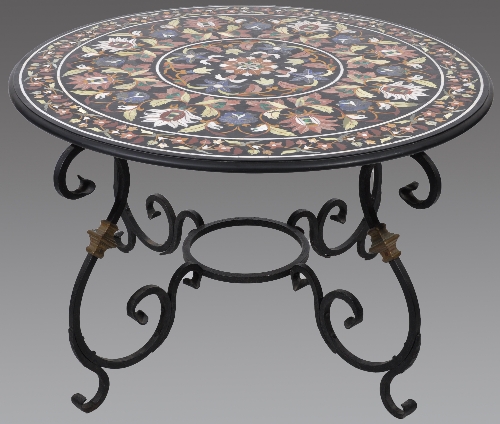 A Florentine style pietra dura circular table top, styled floral decoration, on a wrought iron