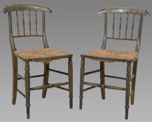 A pair of Victorian painted bedroom chairs, with spindle backs, yoke rails, rush seats, 
83cms and