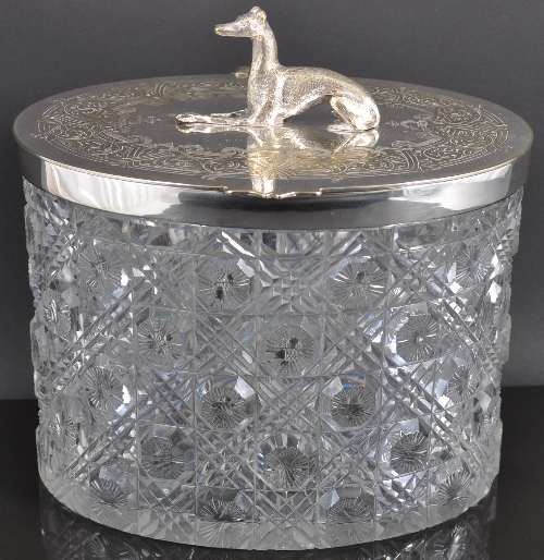 An Edwardian cut glass and electroplated biscuit box, of straight sided oval form, the hinged lid