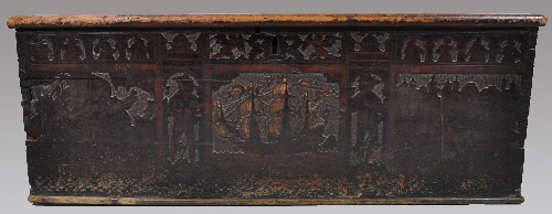 A carved and pen work cedar wood cassone, North Italian, basically 17th Century, the front panel