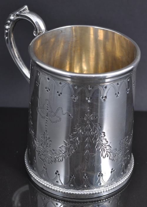 A Victorian silver mug, by H. J. Lias & Son,  London 1877, engraved decoration of swags and ribbon