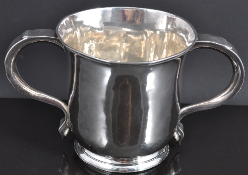 A George II two handled loving cup, probably by John Wirgman, London 1748, slightly flared form,