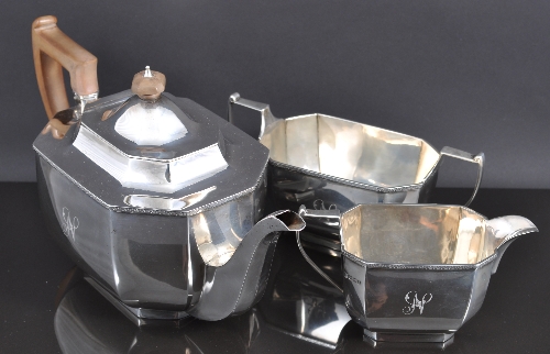 Three piece silver tea set by Thomas Bradbury & Sons, Sheffield, 1926-28, rectangular form with