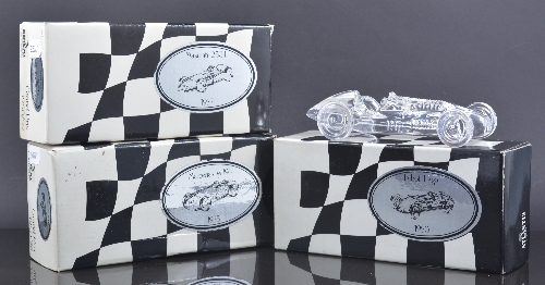 A set of twelve Atlantis Crystal paperweights, modelled as Grand Prix cars from 1950-59 (12)