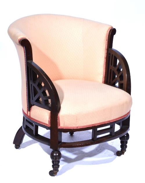 An Aesthetic movement armchair, circa 1870, in the manner of Godwin, the mahogany frame showing
