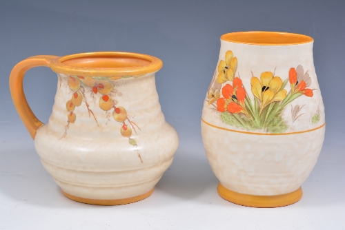 Crown Ducal mug-shape vase, floral decoration, pattern number 5302, 13cms and an ovoid vase, of