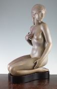 A Lladro bisque seated nude figure, `The Nymph`, no. 2014, limited edition, signed to base by