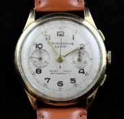 A gentleman`s 1950`s? Swiss 18ct gold chronograph wrist watch, with Arabic numerals and two