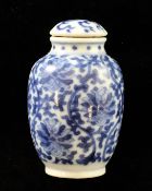 A Chinese blue and white `lotus` ovoid snuff bottle and stopper, Yongzheng mark, 1800-1900, with