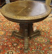 A Victorian oak centre table, with circular top and lion carved feet, 2ft 11in.