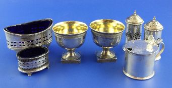 A pair of 19th century German? silver pedestal tub salts, with engraved bands, on square foot,