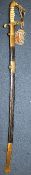 A 20th century German Naval officer`s sword, with lion head pommel, pierced guard and pipe back