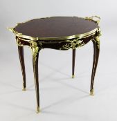 A Louis XV style French ormolu mounted mahogany and satinwood centre table, in the manner of
