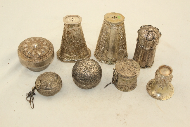 A group of Malaysian and Indonesian silver tepak sirih items, late 19th / early 20th century, each