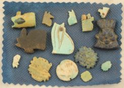 A group of Egyptian stone artefacts, to include a lapis lazuli bes, two wedjat eyes of horus and