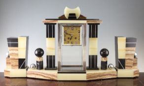 A stylish French Art Deco onyx and marble clock garniture, the square gilt dial inscribed Flagard